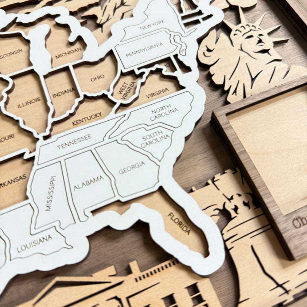 Wooden cutout of the United States with state names on a wooden surface