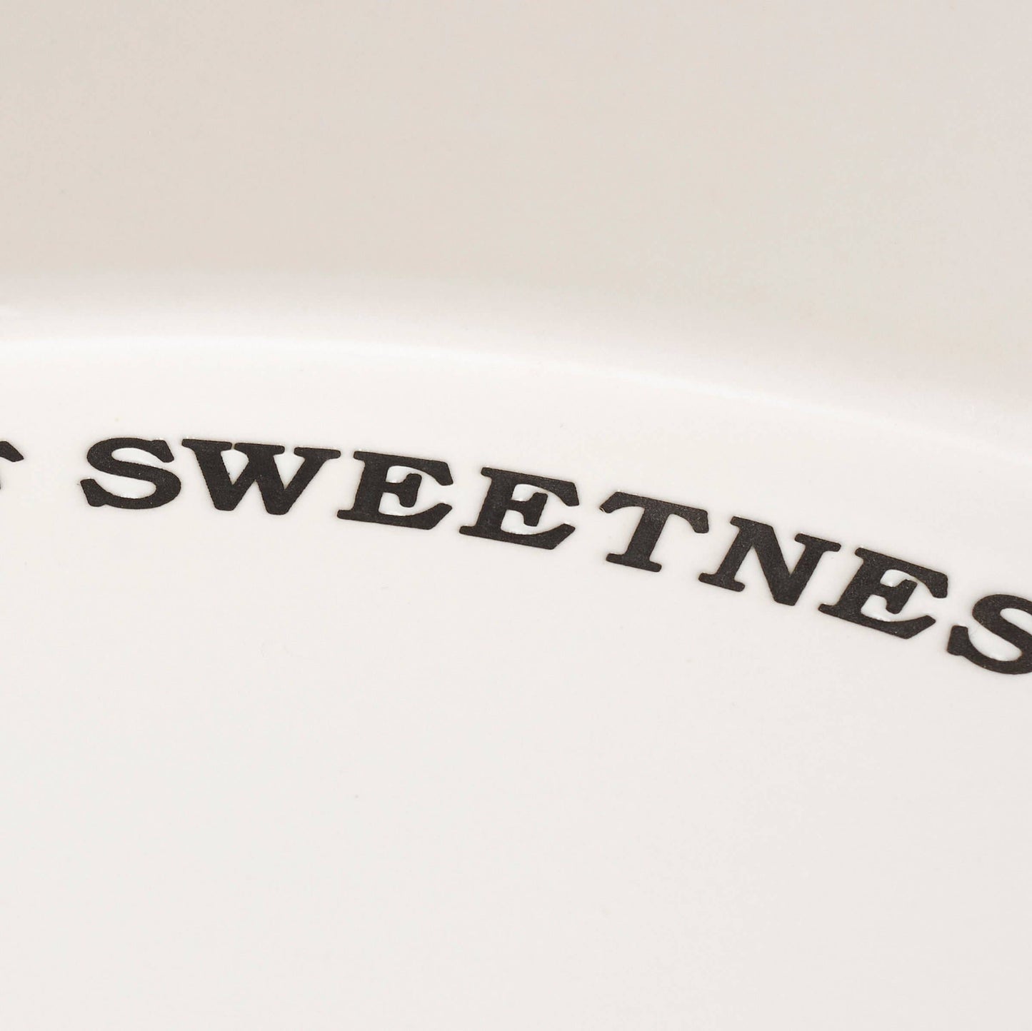 White ceramic bakeware pie pan perfect for dessert serving.