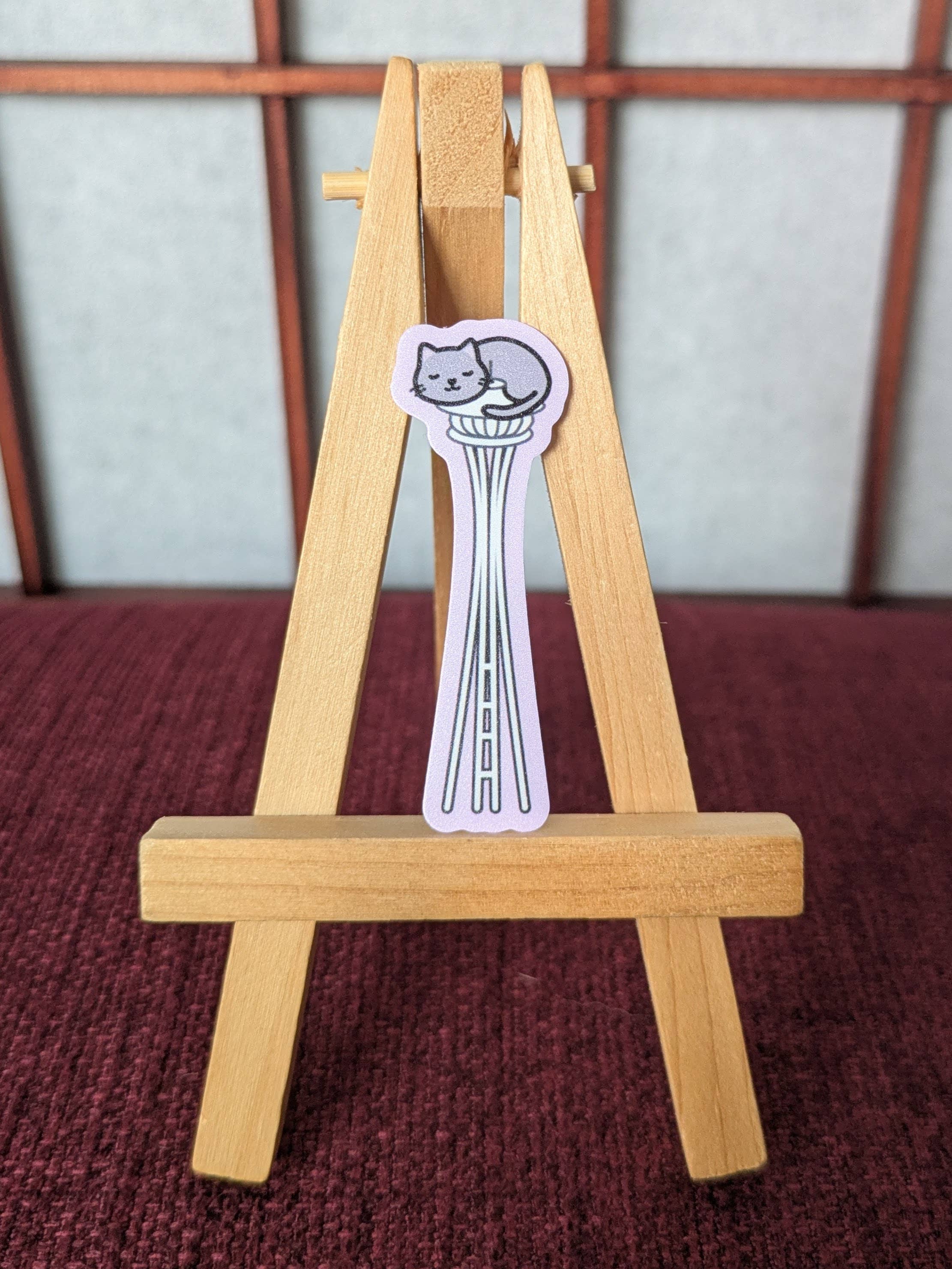 Cats on the Space Needle Seattle vinyl waterproof sticker: Orange cat with yellow background