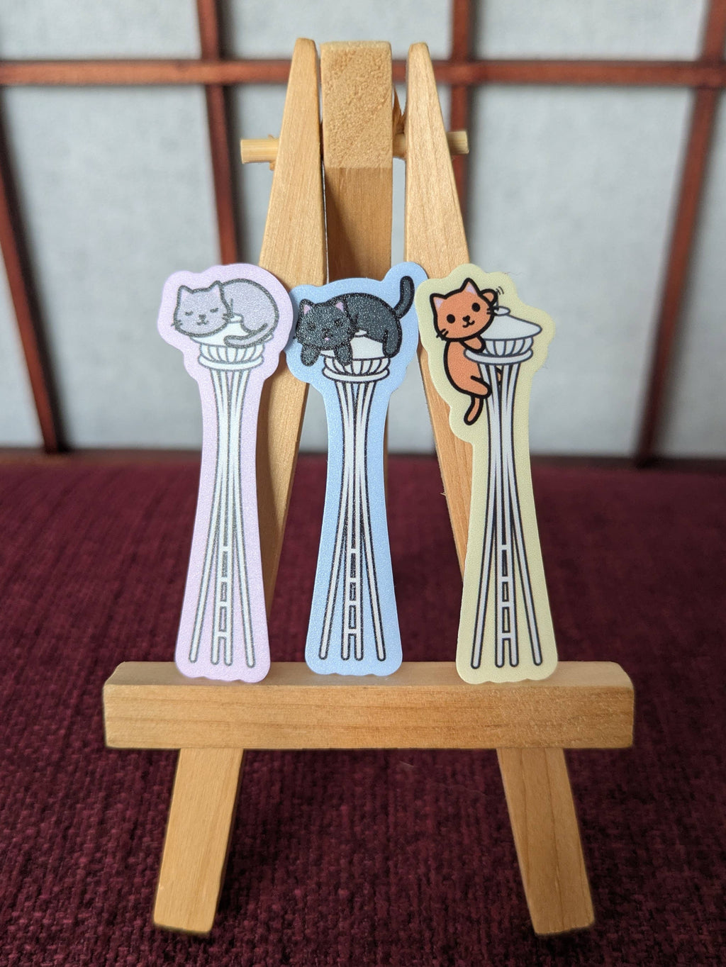 Cats on the Space Needle Seattle vinyl waterproof sticker: Orange cat with yellow background