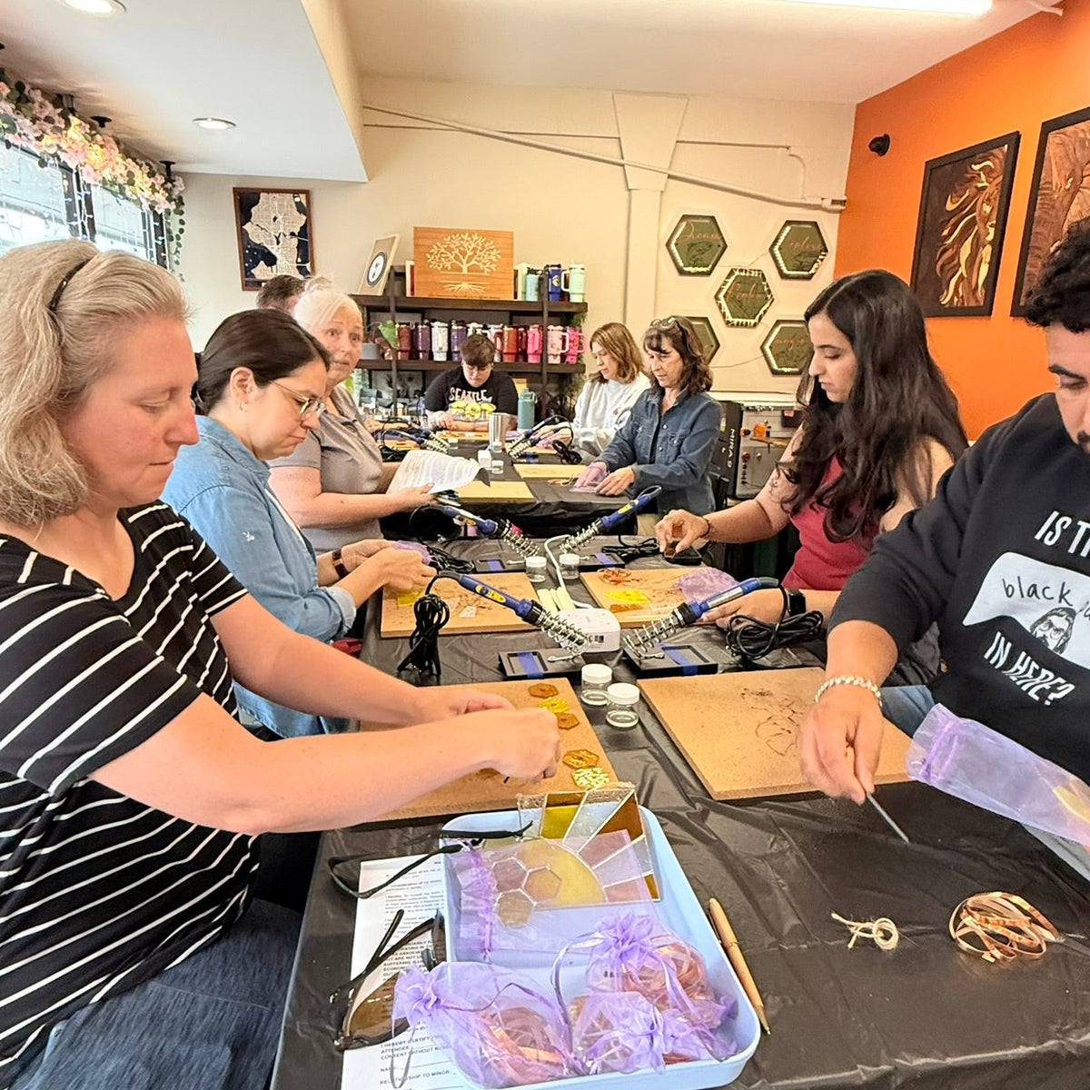 A small-group stained-glass class where participants learn copper foiling, soldering, and assembly.