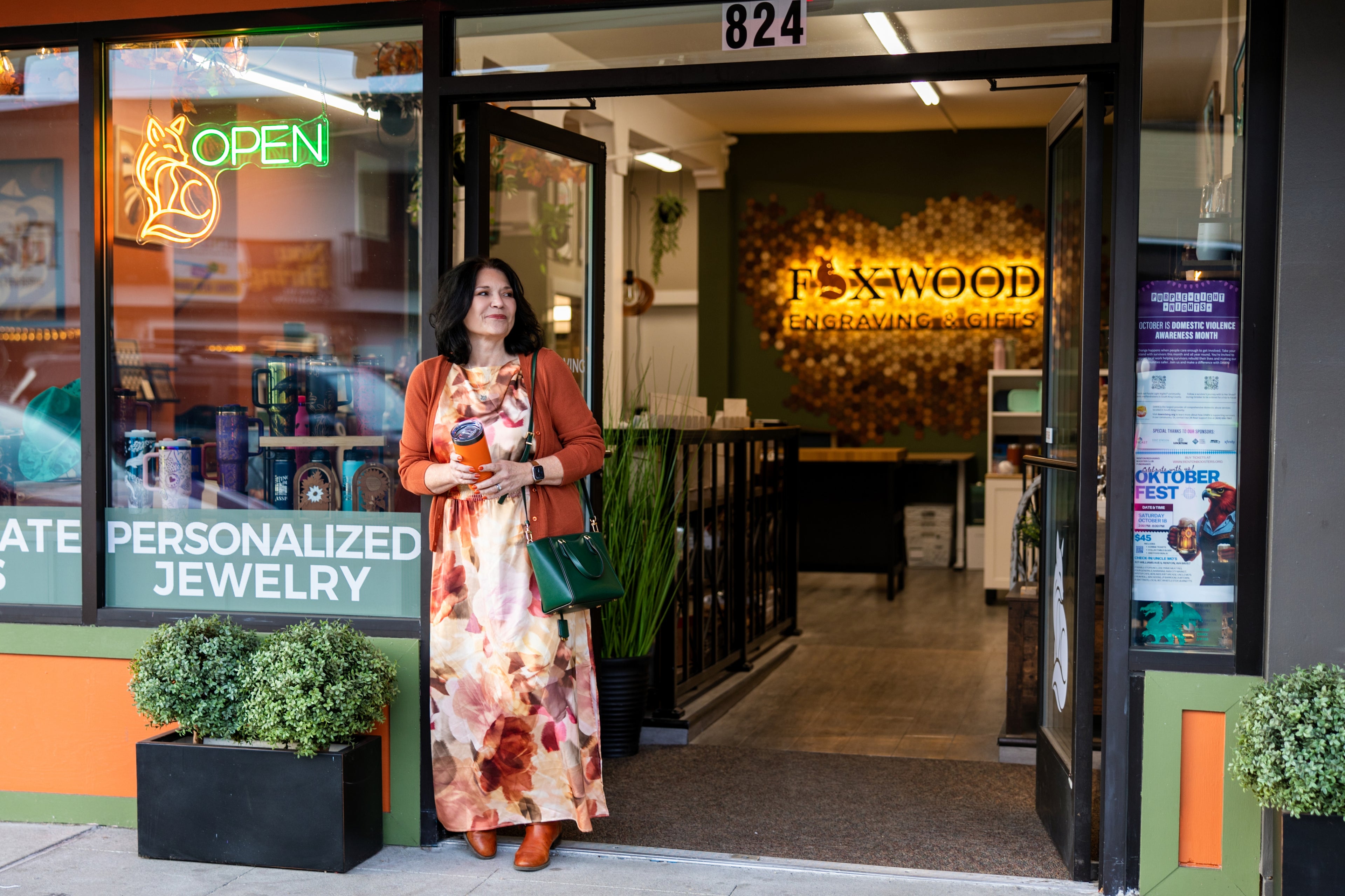 Funder Joanna Lis in front of Foxwood storefront downtown Renton WA