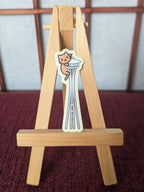 Cats on the Space Needle Seattle vinyl waterproof sticker: Orange cat with yellow background