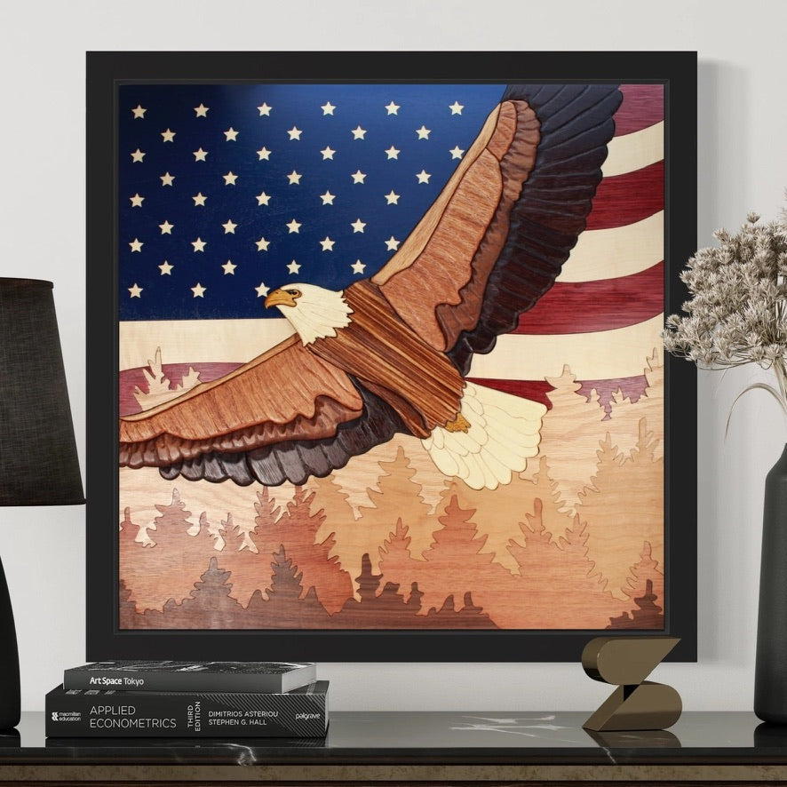 Framed bald eagle and American flag artwork handcrafted from layered contrasting woods.