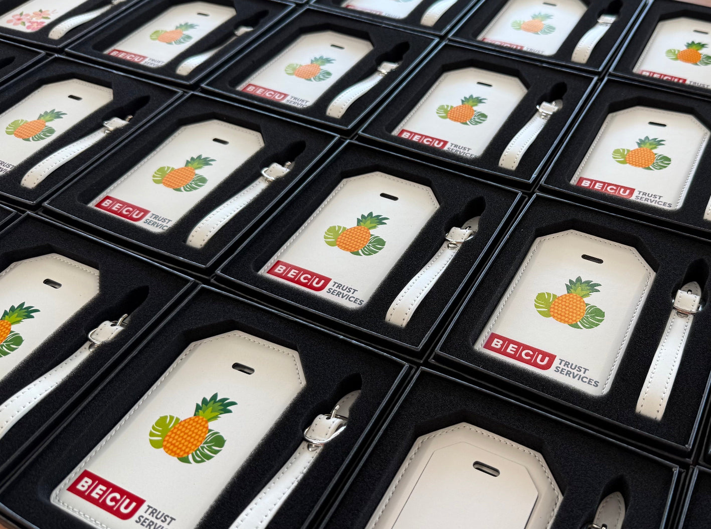 Branded BECU luggage tags created for a tropical-themed corporate event