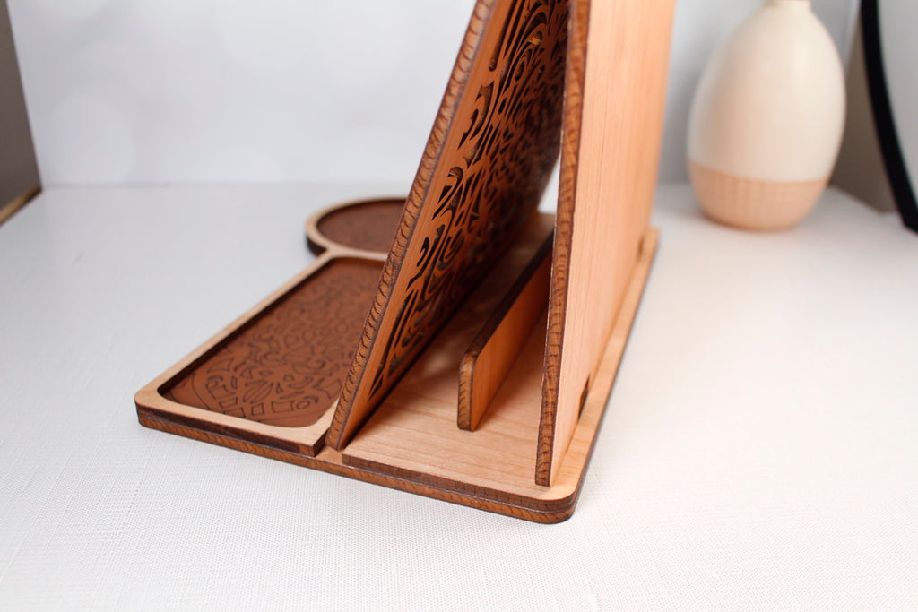 Side profile of folding wooden book stand showing adjustable support