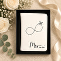 Personalized passport wallets set for couples with custom names.