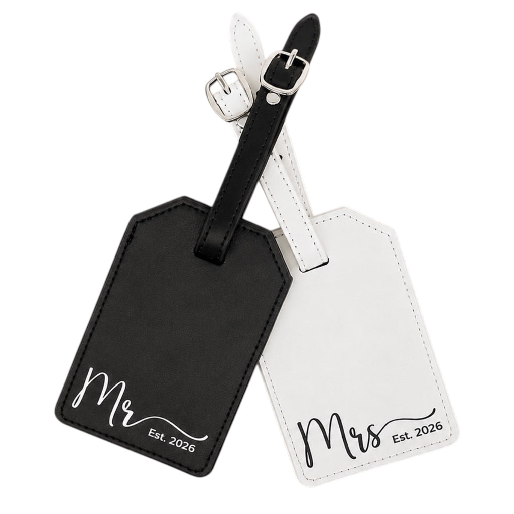 Personalized luggage tags set for couples with custom names.
