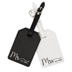 Personalized luggage tags set for couples with custom names.