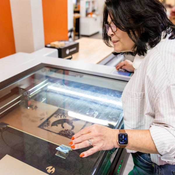 Laser engraving custom wood at Foxwood Engraving studio