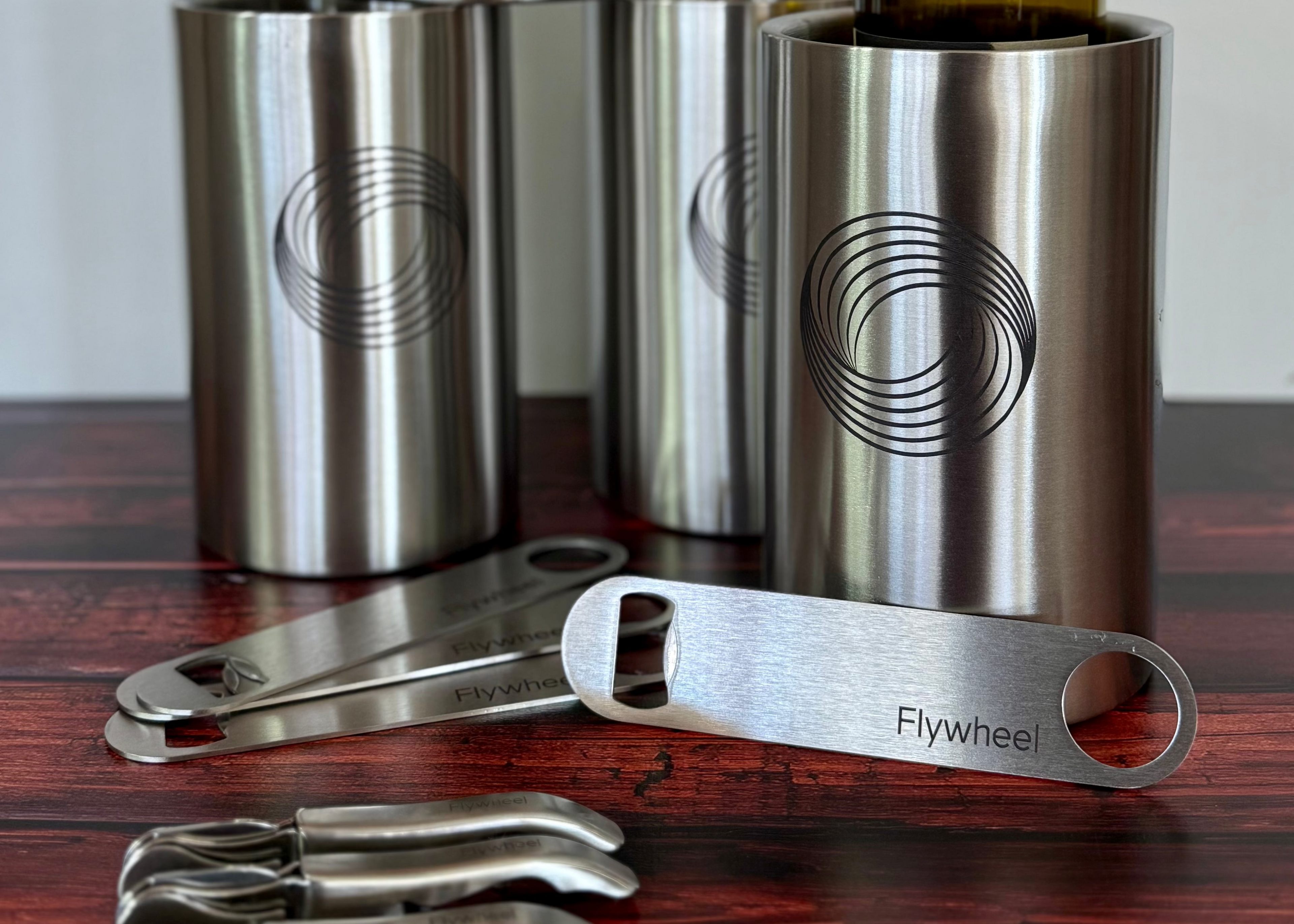 Collection of custom promotional products including branded drinkware, office gifts, and personalized merchandise for businesses and events.