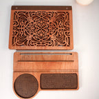 Top-down view of engraved wooden book valet with built-in mug holder
