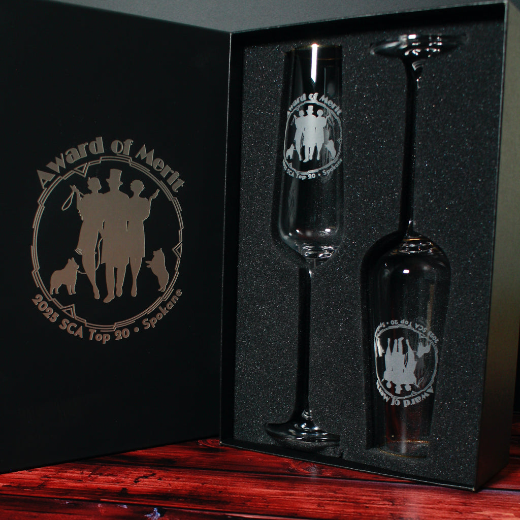 Champagne flutes engraved with corporate award logo