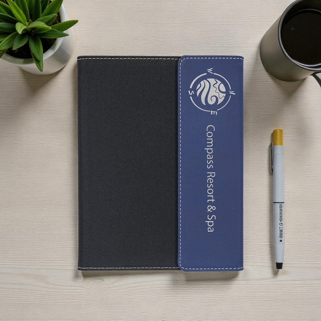 Engraved flap portfolio with stitched fabric design and refillable pages.