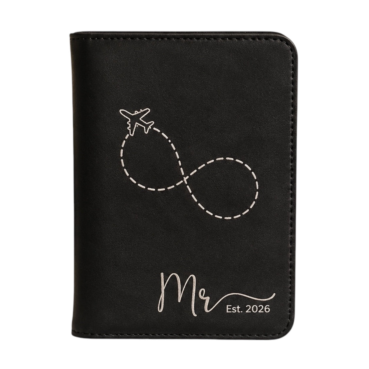 Close-up of engraved leatherette passport holder for men.