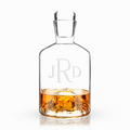 engraved mountain crystal decanter with whiskey inside