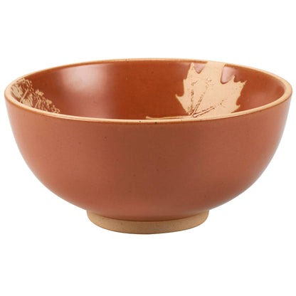Farmhouse-style stoneware bowls with rustic fall leaf motif.