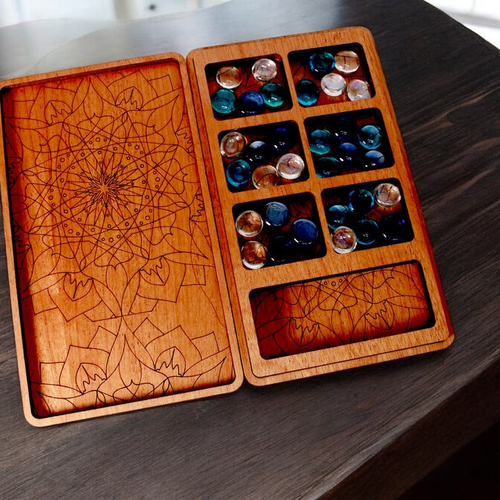 Foxwood Engraving handcrafted wooden Mancala set made in Renton, WA.