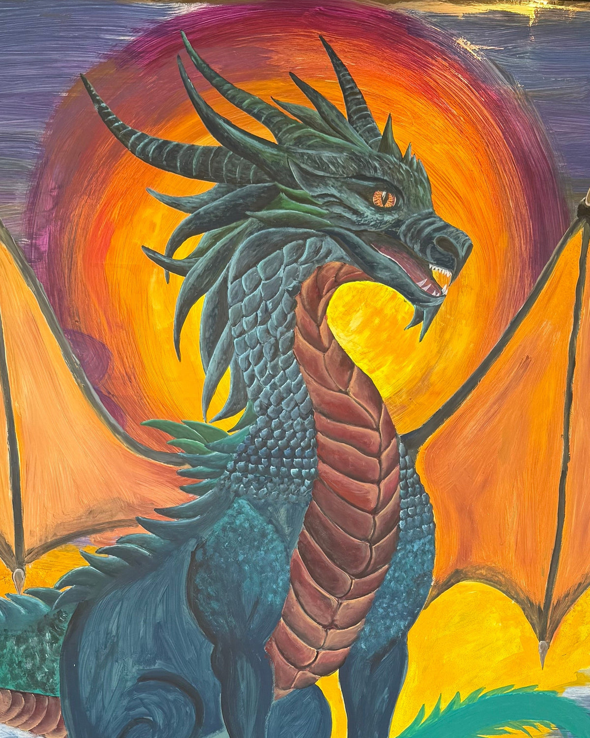 Large colorful dragon mural hand-painted on the front window of Foxwood’s Renton studio