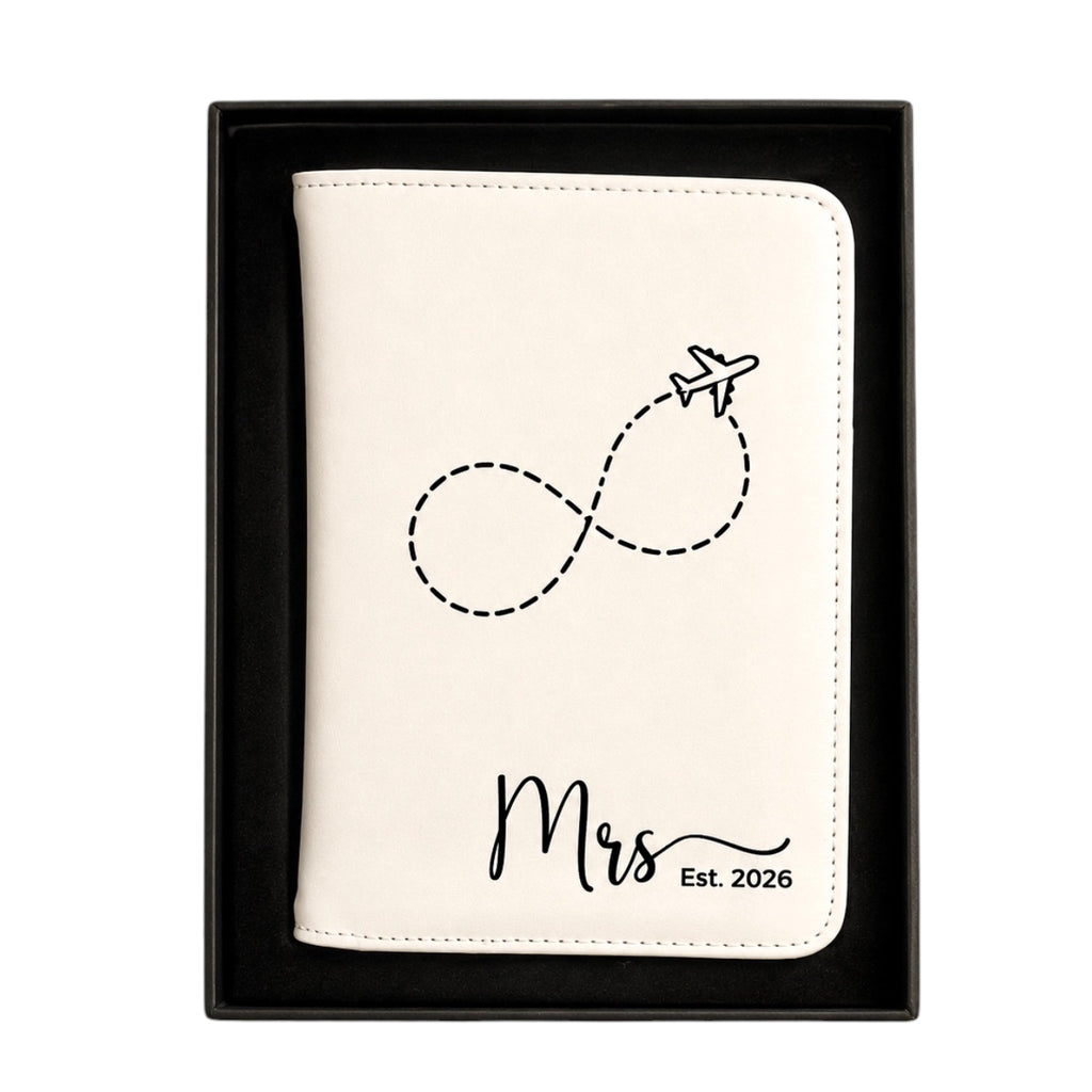 Custom engraved travel sets for honeymoon including luggage tags and passport holders.