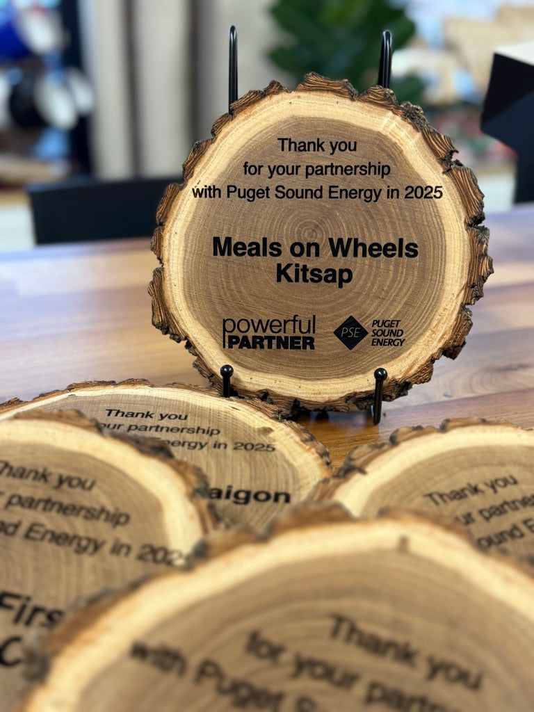 Rustic live-edge wood appreciation awards with engraved partnership message