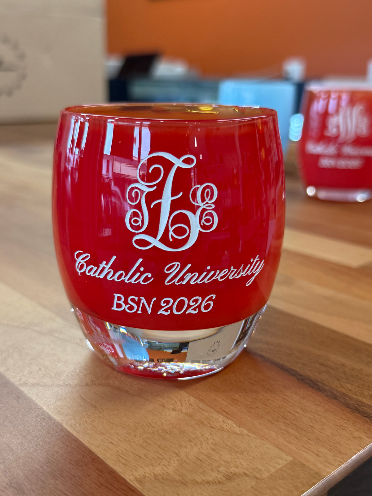 Red glassybaby vessel personalized with an ornate monogram and Catholic University BSN 2026 graduation message