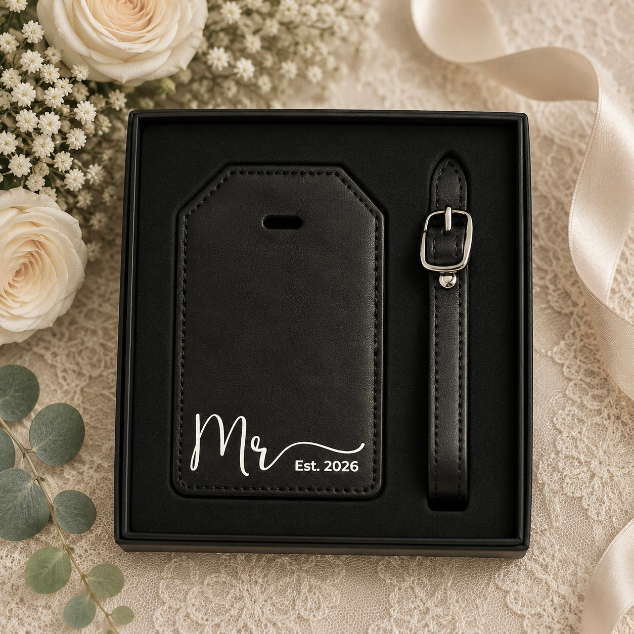 Close-up of custom engraved wedding luggage tag with script font.