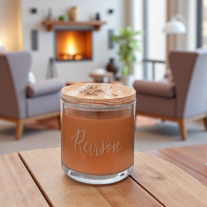 Pumpkin Spice candle in glass jar with engraved wood lid.