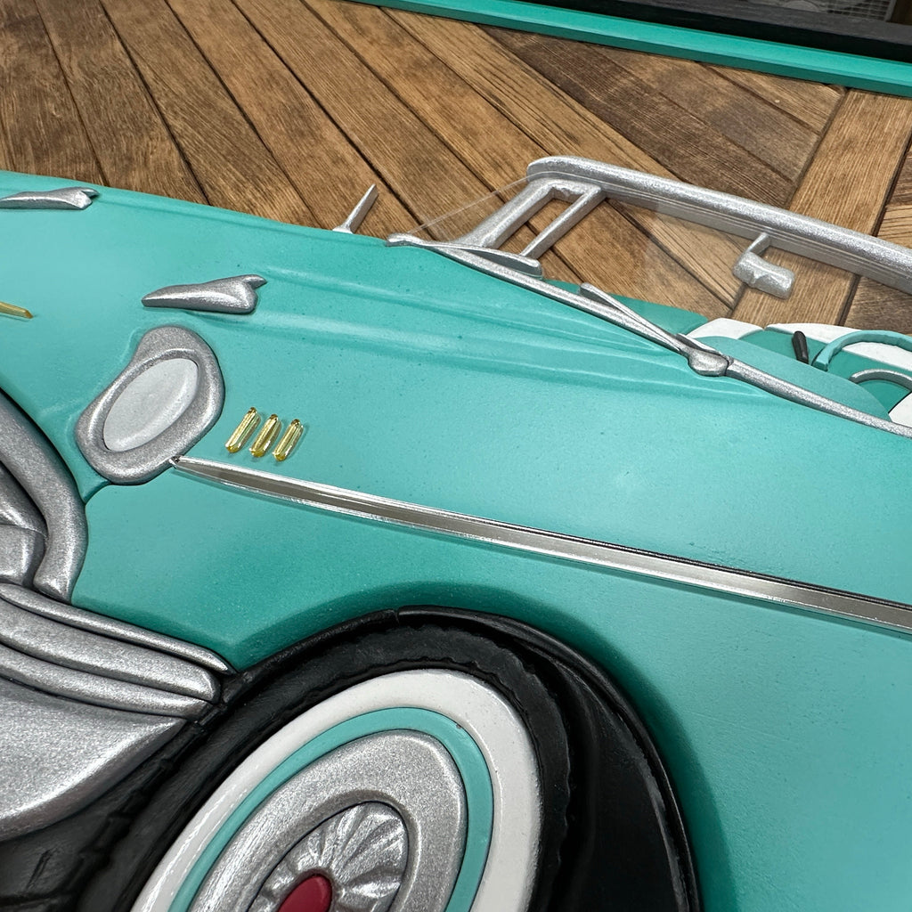 Retro 1957 Chevy Bel Air wall decor handcrafted from layered wood and hand-painted for depth.