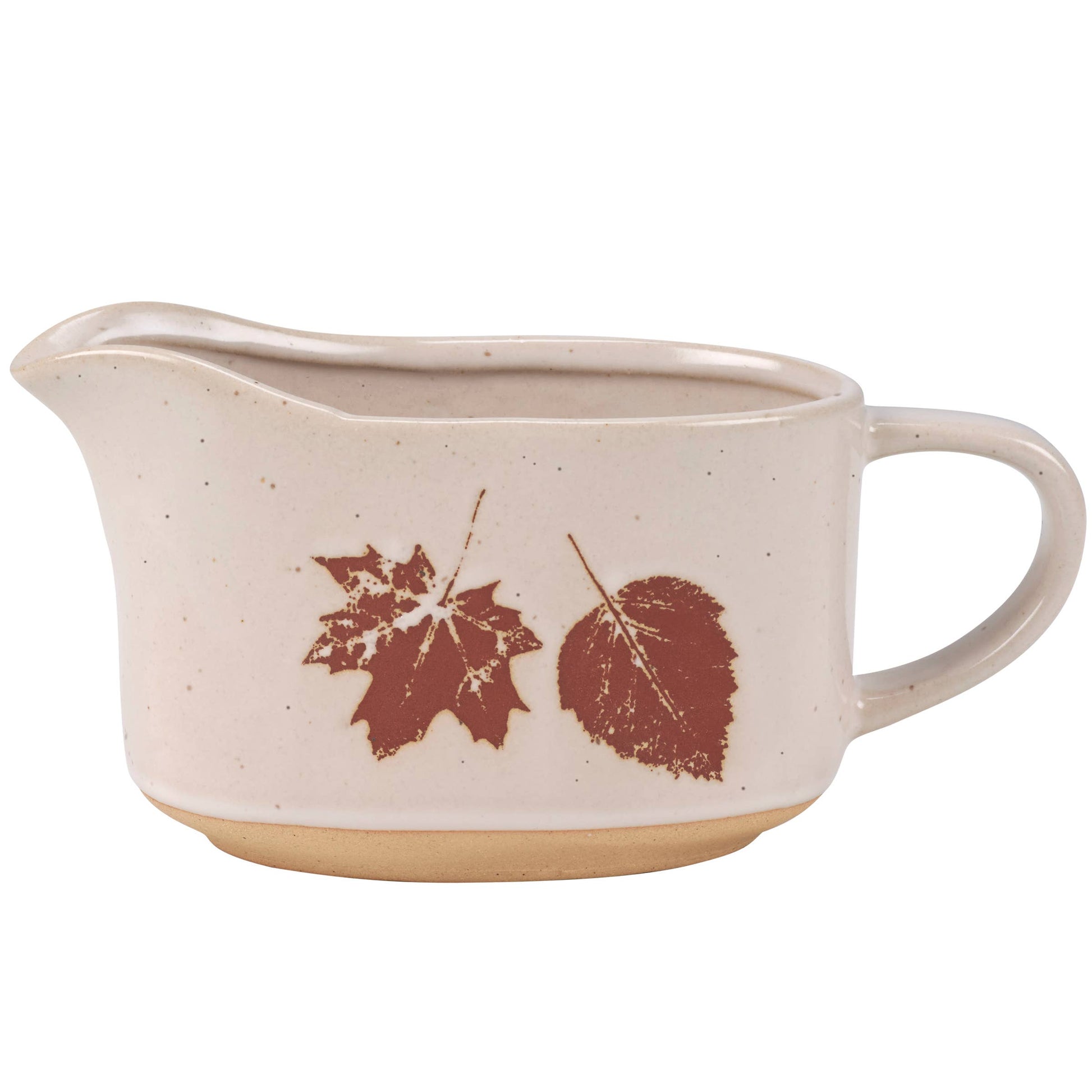 Rustic ceramic gravy pitcher with autumn leaf motif and bare base.