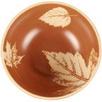 Rustic ceramic bowls featuring debossed leaf design for cozy autumn tables.