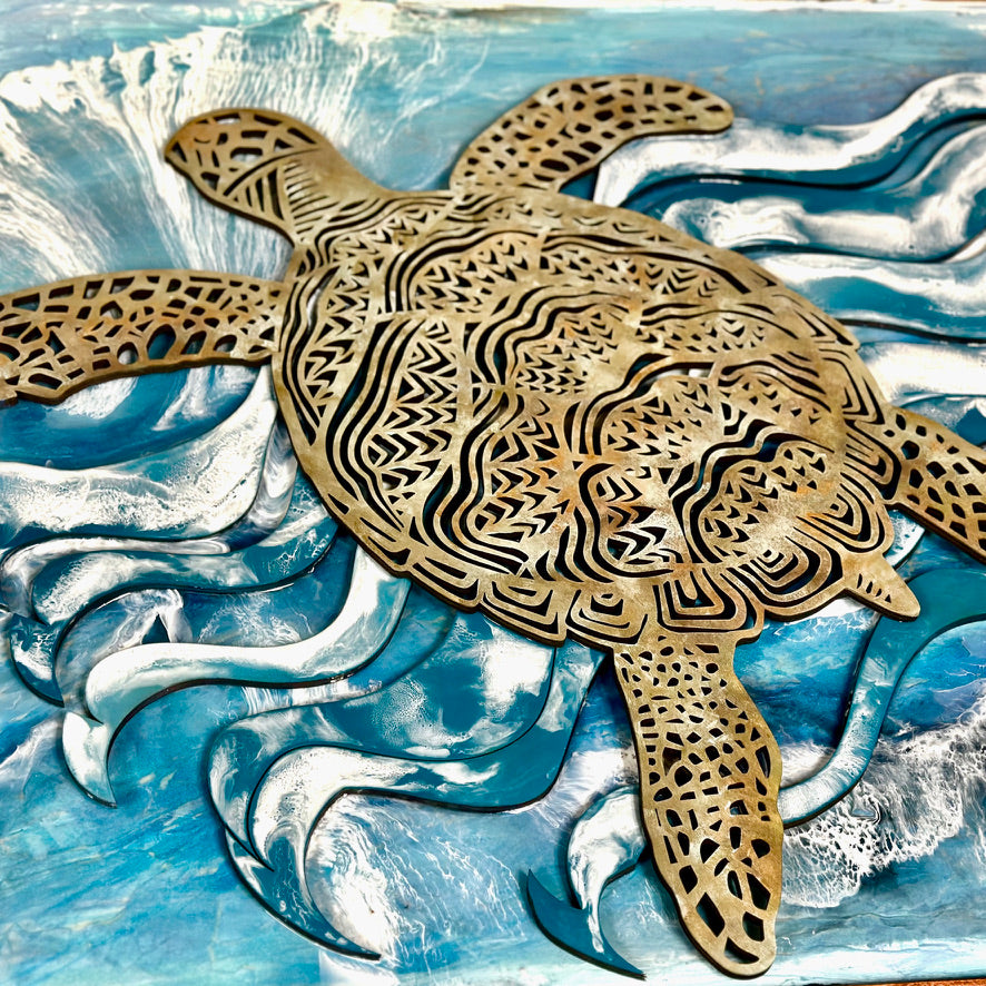 Mixed-media ocean artwork with two dimensional wooden sea turtles and raised resin waves.