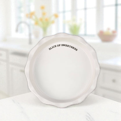 White stoneware pie plate with Slice of Sweetness sentiment.
