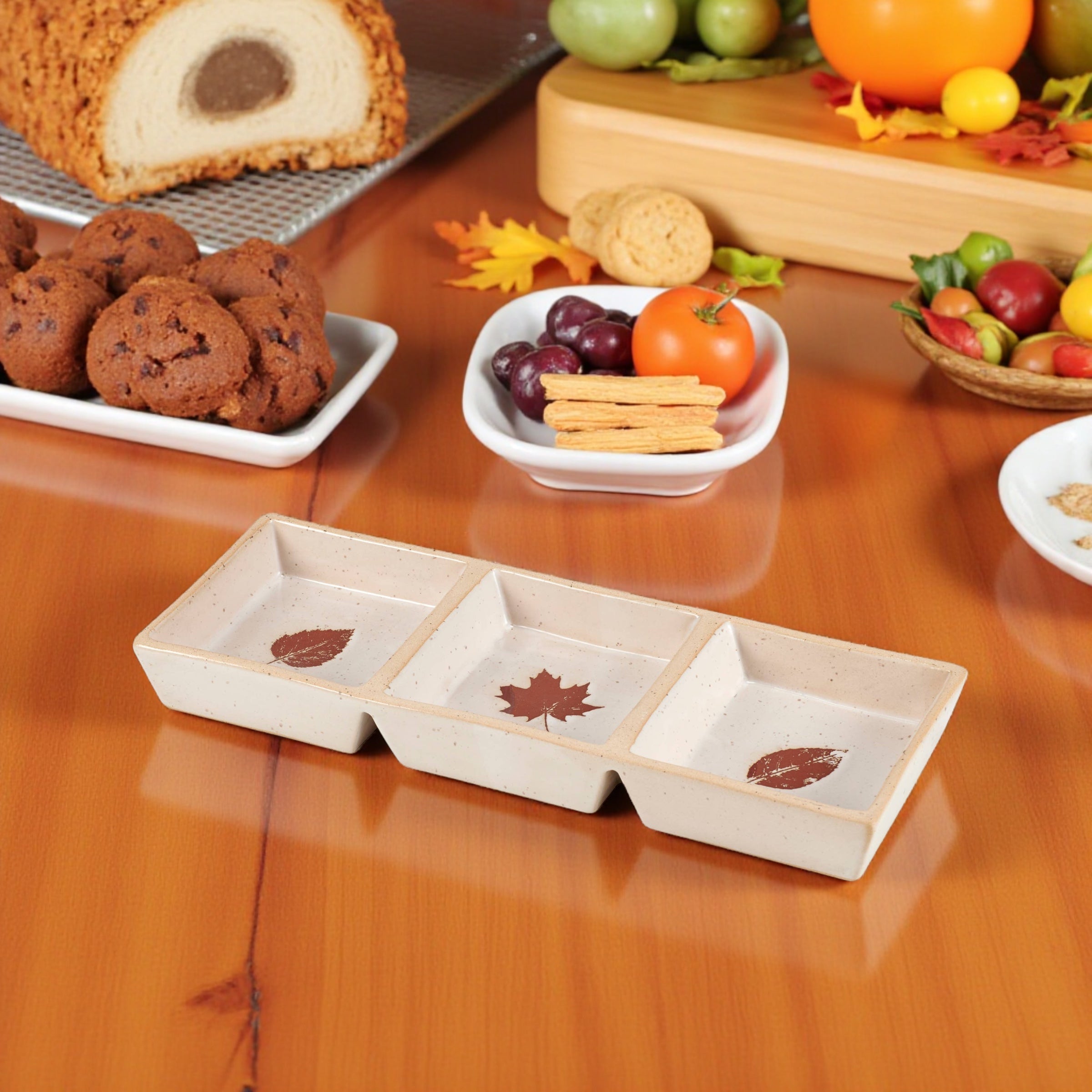 Triple-section ceramic tray perfect for Thanksgiving appetizers