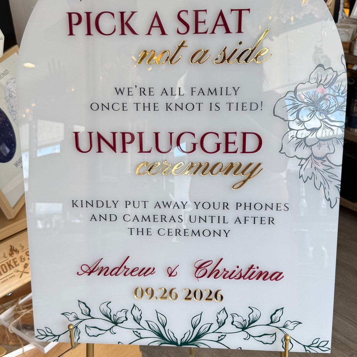 Custom acrylic wedding ceremony sign combining full-color UV printing with raised gold acrylic lettering.