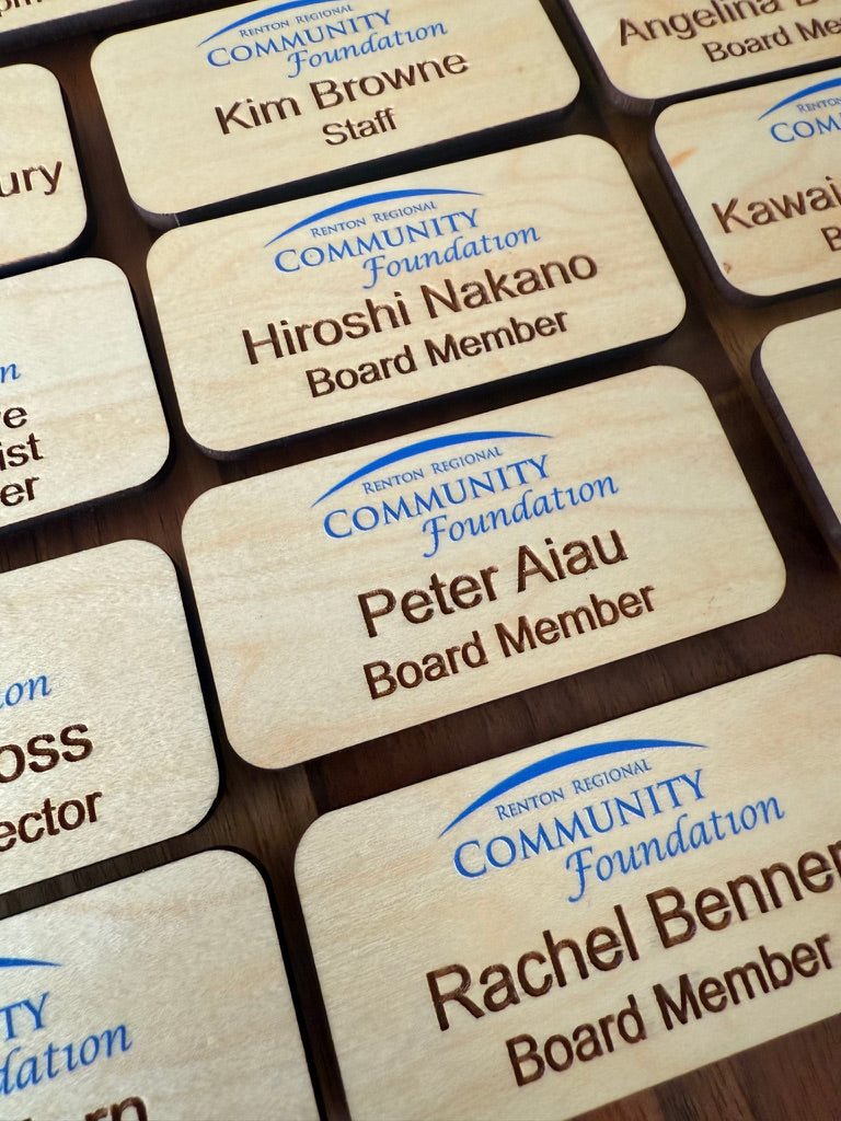 Personalized wood name badges UV printed for Renton Regional Community Foundation board members.