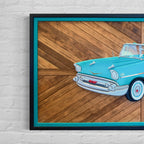 Hand-painted turquoise and chrome 1957 Chevy Bel Air art mounted on wood mosaic background.