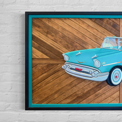 Hand-painted turquoise and chrome 1957 Chevy Bel Air art mounted on wood mosaic background.
