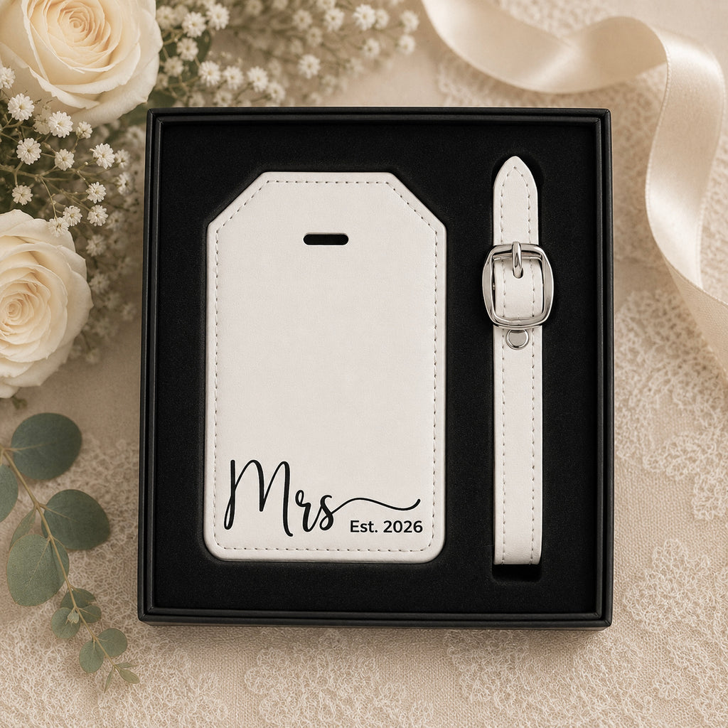 Leatherette luggage tag set presented in black gift box for wedding gifting.