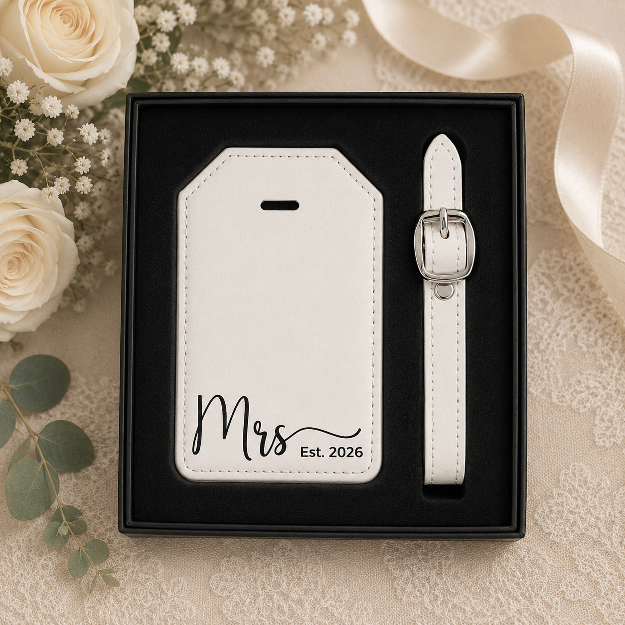 Leatherette luggage tag set presented in black gift box for wedding gifting.