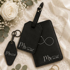 Black leatherette personalized wedding travel set with matching luggage tag, passport holder, and keychain.