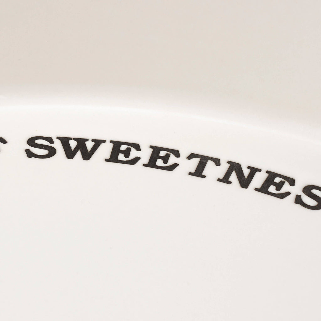White ceramic bakeware pie pan perfect for dessert serving.
