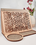 Front view of engraved wooden book valet with integrated cup holder