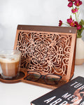 Laser engraved book holder displayed with coffee mug for reading nook